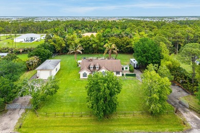 Set on a beautifully manicured and fenced 1.15-acre lot, this - photo 45