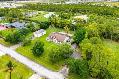 Set on a beautifully manicured and fenced 1.15-acre lot, this - photo 46