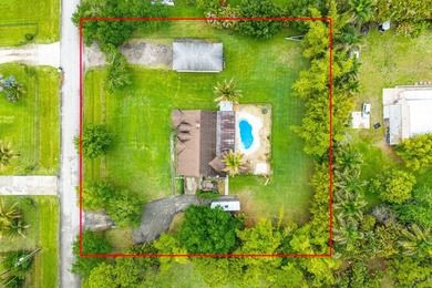 Set on a beautifully manicured and fenced 1.15-acre lot, this - photo 48
