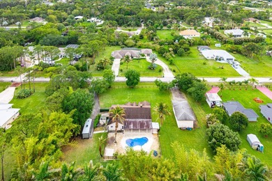 Set on a beautifully manicured and fenced 1.15-acre lot, this - photo 49