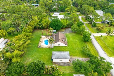 Set on a beautifully manicured and fenced 1.15-acre lot, this - photo 50