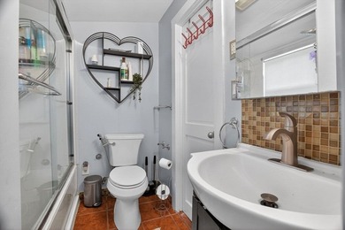 Nestled in a picturesque waterfront setting, this single family - photo 20