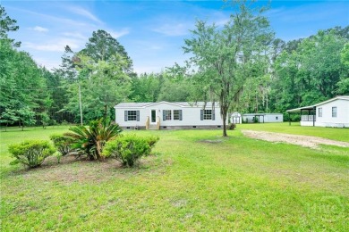 Lake Home For Sale in Midway, Georgia