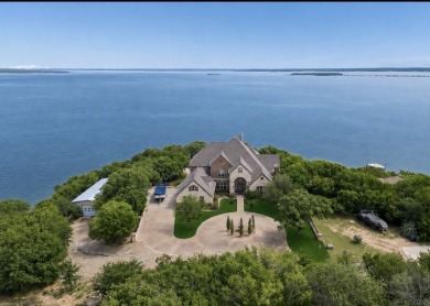 Waterfront views take center stage in this exceptional estate - photo 1