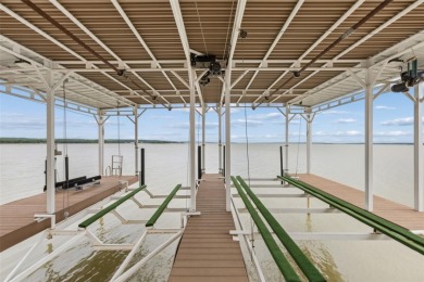 Waterfront views take center stage in this exceptional estate - photo 10