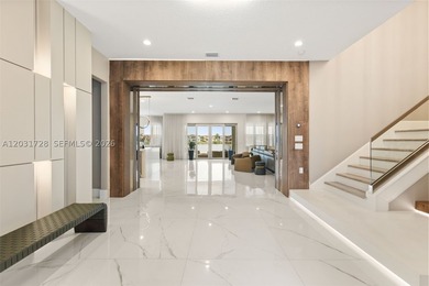 Lakefront living doesn't get more refined than this. Set within - photo 3