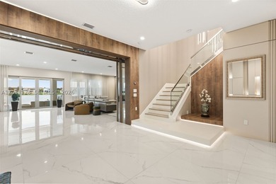 Lakefront living doesn't get more refined than this. Set within - photo 4
