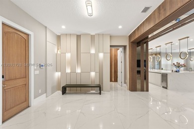 Lakefront living doesn't get more refined than this. Set within - photo 5