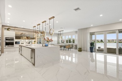 Lakefront living doesn't get more refined than this. Set within - photo 6
