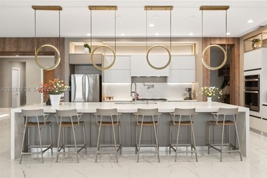 Lakefront living doesn't get more refined than this. Set within - photo 9