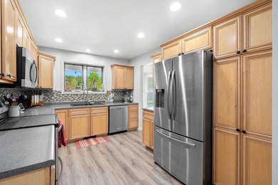 Set in a peaceful, secluded location, this 4 bedroom, 2 bathroom - photo 2