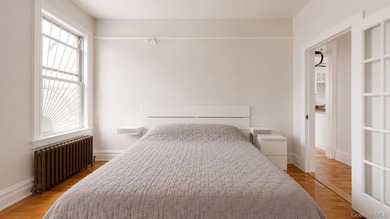 Perched on the top floor of a charming and meticulously - photo 12