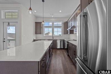 This newly constructed 3-bedroom, 3.5-bathroom townhome offers