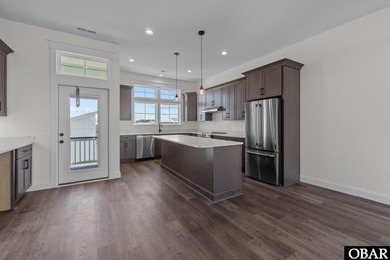 This newly constructed 3-bedroom, 3.5-bathroom townhome offers