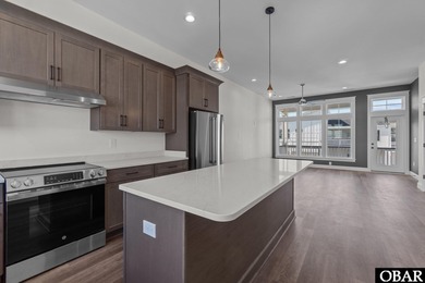 This newly constructed 3-bedroom, 3.5-bathroom townhome offers