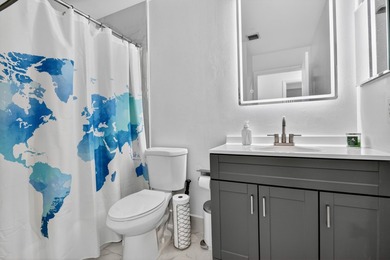 Step into this exquisitely updated 3-bedroom, 2-bathroom with a - photo 15