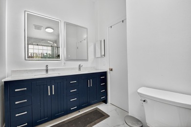 Step into this exquisitely updated 3-bedroom, 2-bathroom with a - photo 18