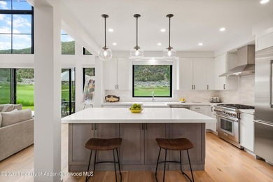 Nestled within the gates of the prestigious Aspen Glen Club - photo 19