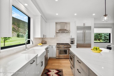 Nestled within the gates of the prestigious Aspen Glen Club - photo 20