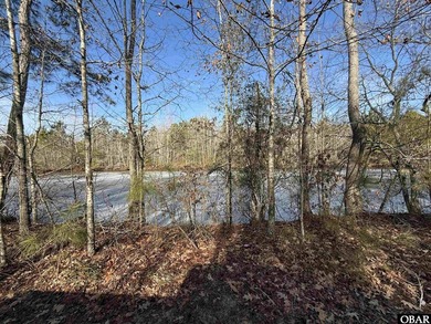 A .9 acre wooded lot located in a small subdivision in Roper, NC - photo 3
