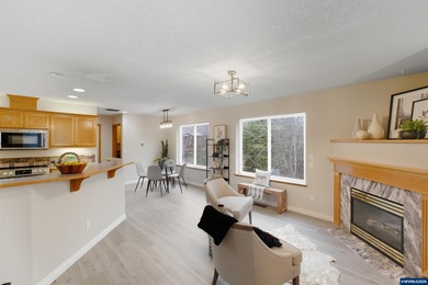 Newer roof, flooring, windows, furnace, heat pump, upper deck