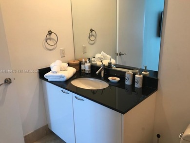 FLAWLESS 2 BDR + CONVERTED ENCLOSED DEN AS 3RD BDR / 3 FULL BTHS