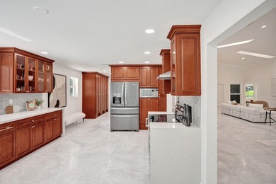 Welcome to 2401 NW 39th St! Situated in the highly sought-after - photo 24