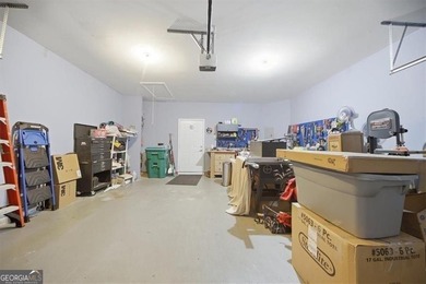 Welcome home to this beautifully maintained ranch-style townhome - photo 25
