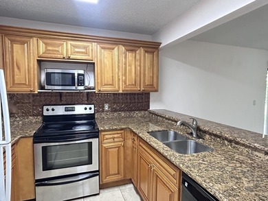 First floor corner unit featuring Water View, ceramic tile in - photo 5