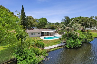 Sought after Lloyd Estates pool & waterfront home across from - photo 2