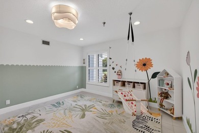 Located within the prestigious Eastpointe Country Club with - photo 11