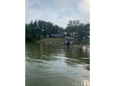 This lake lot has .355 acres with 91 feet of shoreline and a - photo 13