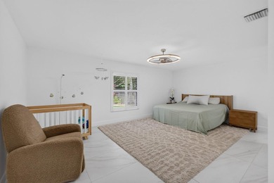 Located within the prestigious Eastpointe Country Club with - photo 13