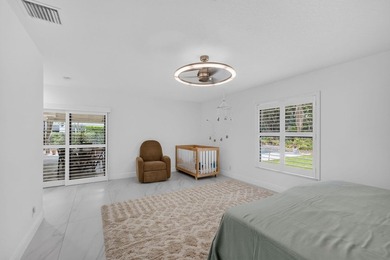 Located within the prestigious Eastpointe Country Club with - photo 15