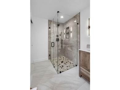 Located within the prestigious Eastpointe Country Club with - photo 18