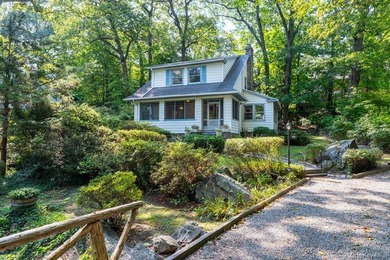 Classic Colonial Charm in a Picturesque warmth of Village Life! - photo 1