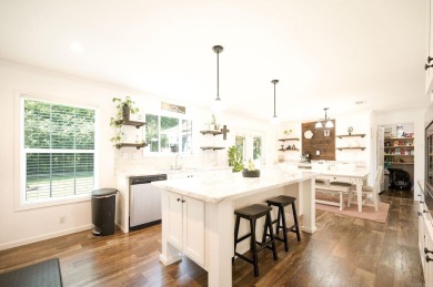 This custom farmhouse offers modern elegance with thoughtful