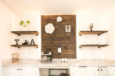 This custom farmhouse offers modern elegance with thoughtful