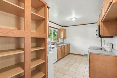 Welcome to this spacious 4-bedroom home, perfectly situated on a - photo 7