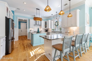 A showcase of refined coastal craftsmanship, this custom-built