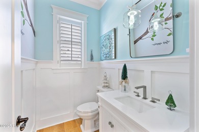 A showcase of refined coastal craftsmanship, this custom-built