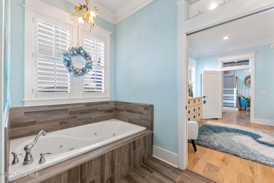 A showcase of refined coastal craftsmanship, this custom-built