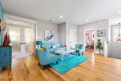 A showcase of refined coastal craftsmanship, this custom-built