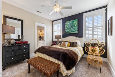 A showcase of refined coastal craftsmanship, this custom-built