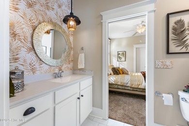 A showcase of refined coastal craftsmanship, this custom-built