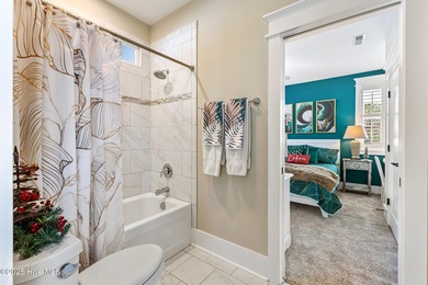 A showcase of refined coastal craftsmanship, this custom-built