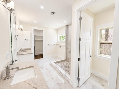 Luxury meets lakeside living in this fully custom new - photo 14