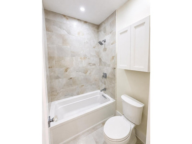 Luxury meets lakeside living in this fully custom new - photo 19