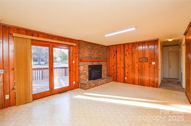 Full brick ranch home with large fenced-in backyard on a quiet