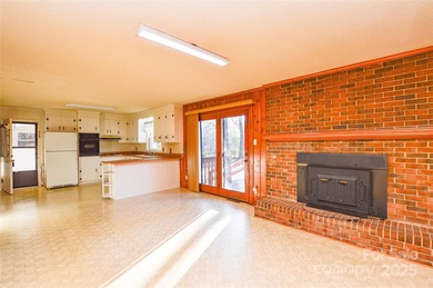 Full brick ranch home with large fenced-in backyard on a quiet